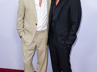 Brad Pitt and George Clooney arrive at the Los Angeles Premiere Of Apple TV+'s 'Wolfs' held at the TCL Chinese Theatre IMAX on September 18,...