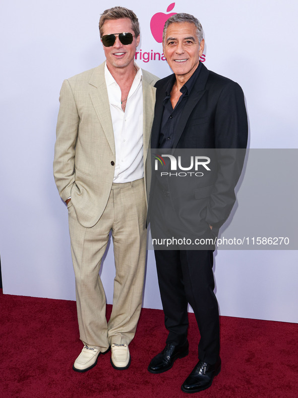 Brad Pitt and George Clooney arrive at the Los Angeles Premiere Of Apple TV+'s 'Wolfs' held at the TCL Chinese Theatre IMAX on September 18,...