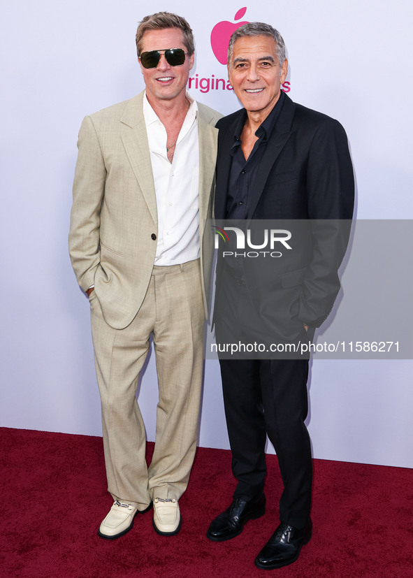 Brad Pitt and George Clooney arrive at the Los Angeles Premiere Of Apple TV+'s 'Wolfs' held at the TCL Chinese Theatre IMAX on September 18,...