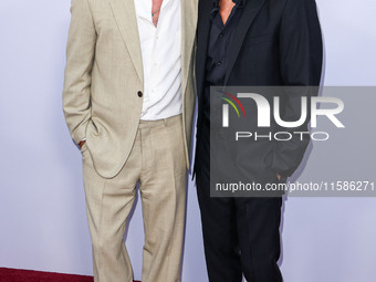 Brad Pitt and George Clooney arrive at the Los Angeles Premiere Of Apple TV+'s 'Wolfs' held at the TCL Chinese Theatre IMAX on September 18,...