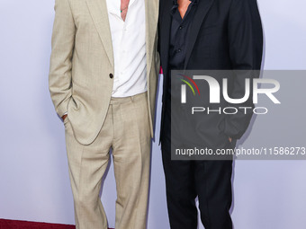 Brad Pitt and George Clooney arrive at the Los Angeles Premiere Of Apple TV+'s 'Wolfs' held at the TCL Chinese Theatre IMAX on September 18,...