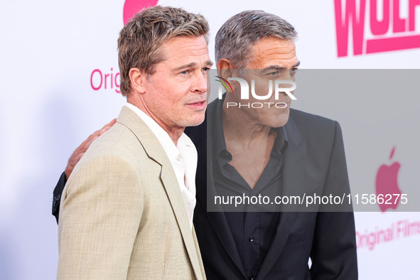 Brad Pitt and George Clooney arrive at the Los Angeles Premiere Of Apple TV+'s 'Wolfs' held at the TCL Chinese Theatre IMAX on September 18,...