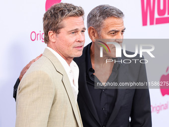 Brad Pitt and George Clooney arrive at the Los Angeles Premiere Of Apple TV+'s 'Wolfs' held at the TCL Chinese Theatre IMAX on September 18,...