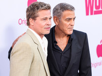 Brad Pitt and George Clooney arrive at the Los Angeles Premiere Of Apple TV+'s 'Wolfs' held at the TCL Chinese Theatre IMAX on September 18,...