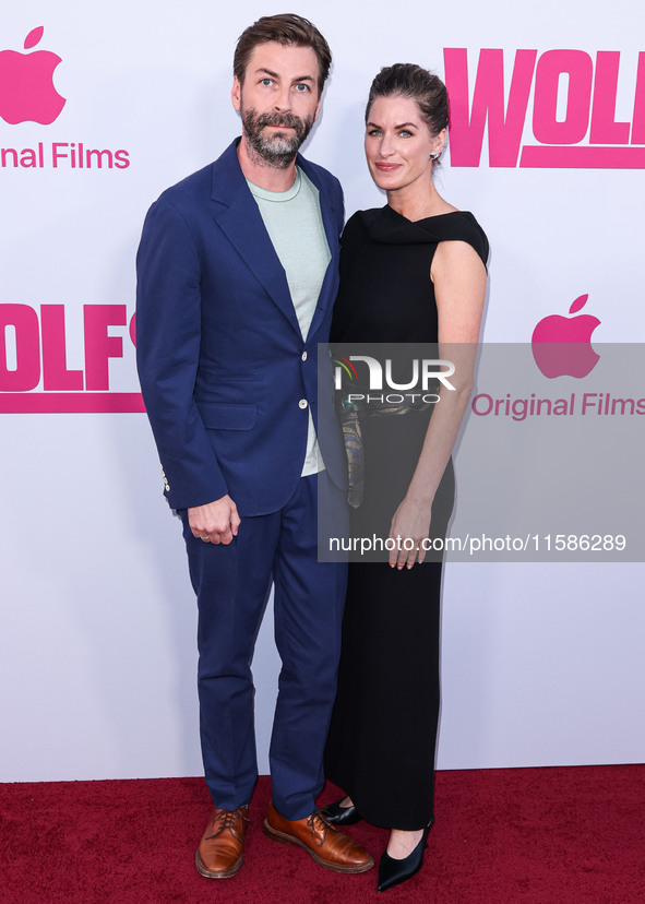 Jon Watts and Dianne McGunigle arrive at the Los Angeles Premiere Of Apple TV+'s 'Wolfs' held at the TCL Chinese Theatre IMAX on September 1...