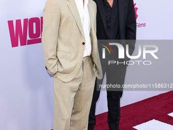 Brad Pitt and George Clooney arrive at the Los Angeles Premiere Of Apple TV+'s 'Wolfs' held at the TCL Chinese Theatre IMAX on September 18,...