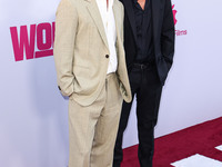 Brad Pitt and George Clooney arrive at the Los Angeles Premiere Of Apple TV+'s 'Wolfs' held at the TCL Chinese Theatre IMAX on September 18,...