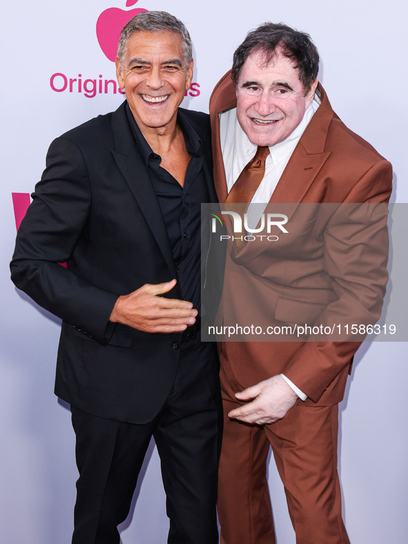 George Clooney and Richard Kind arrive at the Los Angeles Premiere Of Apple TV+'s 'Wolfs' held at the TCL Chinese Theatre IMAX on September...