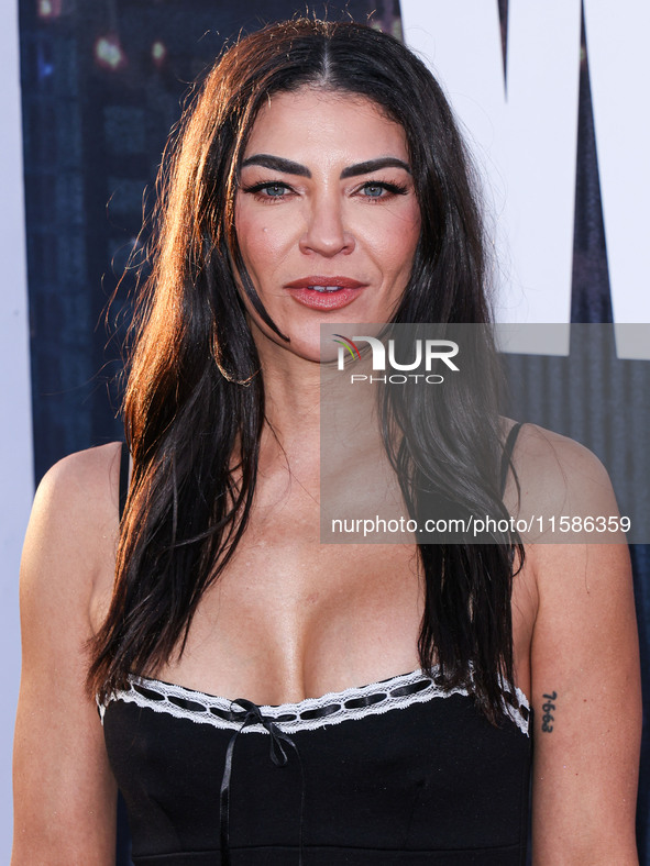 Jessica Szohr arrives at the Los Angeles Premiere Of Apple TV+'s 'Wolfs' held at the TCL Chinese Theatre IMAX on September 18, 2024 in Holly...