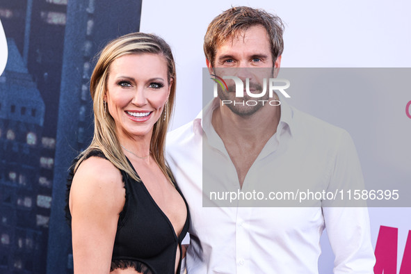 Katie Cassidy and Stephen Huszar arrive at the Los Angeles Premiere Of Apple TV+'s 'Wolfs' held at the TCL Chinese Theatre IMAX on September...