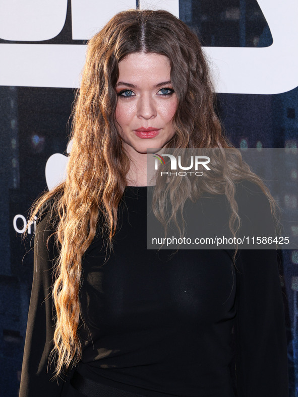 Sasha Pieterse arrives at the Los Angeles Premiere Of Apple TV+'s 'Wolfs' held at the TCL Chinese Theatre IMAX on September 18, 2024 in Holl...