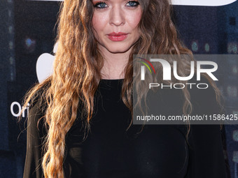 Sasha Pieterse arrives at the Los Angeles Premiere Of Apple TV+'s 'Wolfs' held at the TCL Chinese Theatre IMAX on September 18, 2024 in Holl...