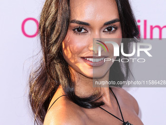 Gizele Oliveira arrives at the Los Angeles Premiere Of Apple TV+'s 'Wolfs' held at the TCL Chinese Theatre IMAX on September 18, 2024 in Hol...