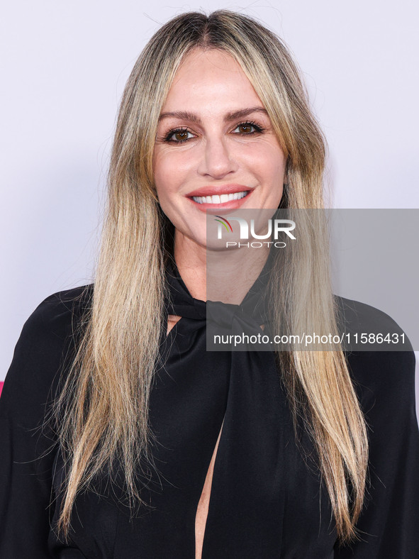 Monet Mazur arrives at the Los Angeles Premiere Of Apple TV+'s 'Wolfs' held at the TCL Chinese Theatre IMAX on September 18, 2024 in Hollywo...