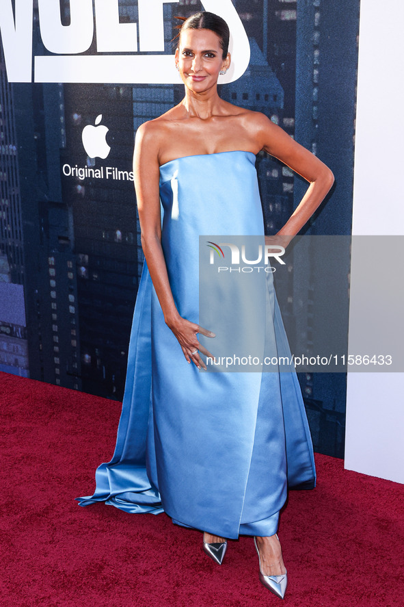 Poorna Jagannathan wearing Prada arrives at the Los Angeles Premiere Of Apple TV+'s 'Wolfs' held at the TCL Chinese Theatre IMAX on Septembe...