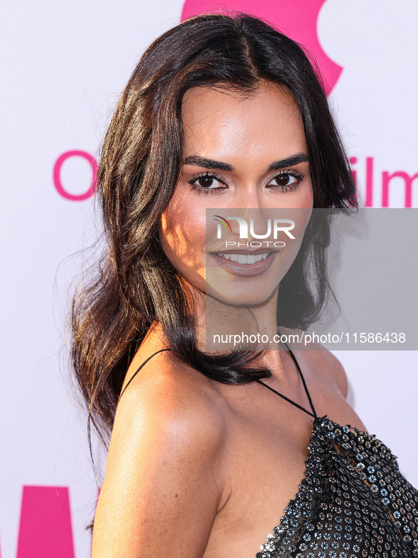 Gizele Oliveira arrives at the Los Angeles Premiere Of Apple TV+'s 'Wolfs' held at the TCL Chinese Theatre IMAX on September 18, 2024 in Hol...