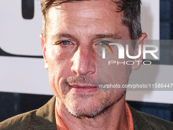 Simon Rex arrives at the Los Angeles Premiere Of Apple TV+'s 'Wolfs' held at the TCL Chinese Theatre IMAX on September 18, 2024 in Hollywood...