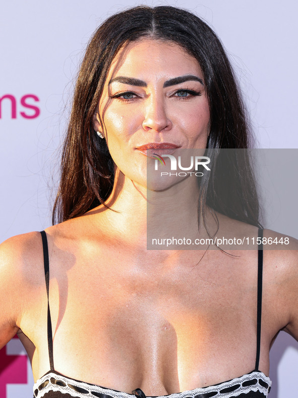 Jessica Szohr arrives at the Los Angeles Premiere Of Apple TV+'s 'Wolfs' held at the TCL Chinese Theatre IMAX on September 18, 2024 in Holly...