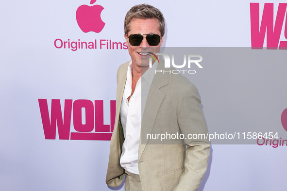 Brad Pitt arrives at the Los Angeles Premiere Of Apple TV+'s 'Wolfs' held at the TCL Chinese Theatre IMAX on September 18, 2024 in Hollywood...