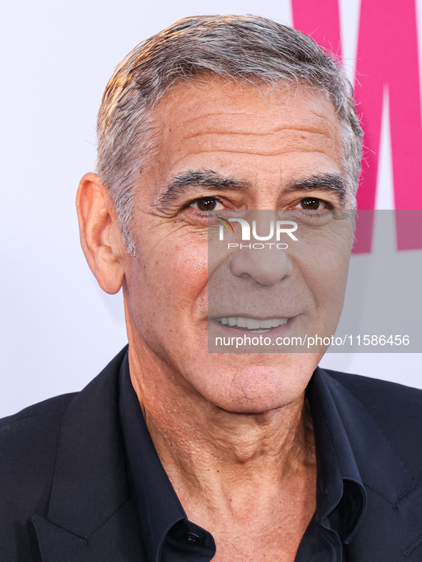 George Clooney arrives at the Los Angeles Premiere Of Apple TV+'s 'Wolfs' held at the TCL Chinese Theatre IMAX on September 18, 2024 in Holl...