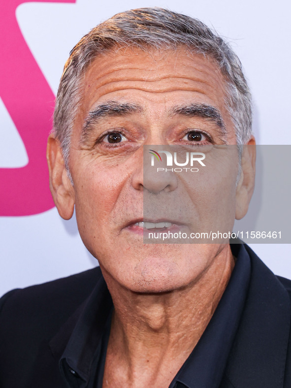 George Clooney arrives at the Los Angeles Premiere Of Apple TV+'s 'Wolfs' held at the TCL Chinese Theatre IMAX on September 18, 2024 in Holl...