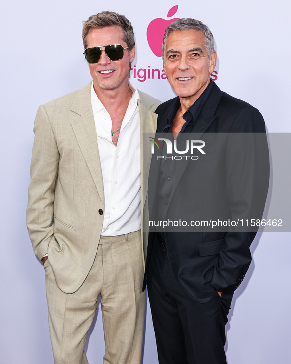 Brad Pitt and George Clooney arrive at the Los Angeles Premiere Of Apple TV+'s 'Wolfs' held at the TCL Chinese Theatre IMAX on September 18,...