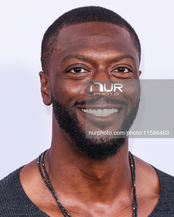 Aldis Hodge arrives at the Los Angeles Premiere Of Apple TV+'s 'Wolfs' held at the TCL Chinese Theatre IMAX on September 18, 2024 in Hollywo...