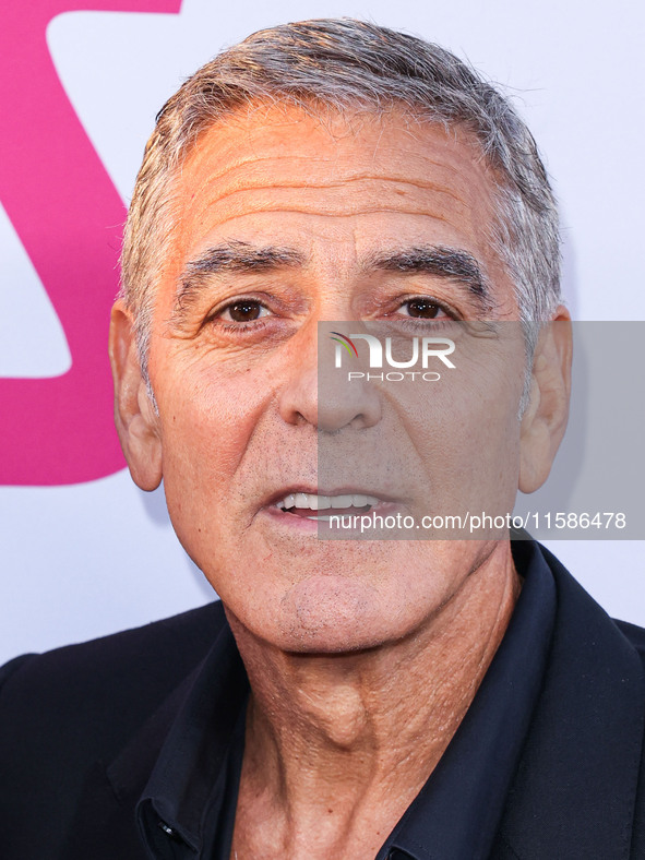 George Clooney arrives at the Los Angeles Premiere Of Apple TV+'s 'Wolfs' held at the TCL Chinese Theatre IMAX on September 18, 2024 in Holl...