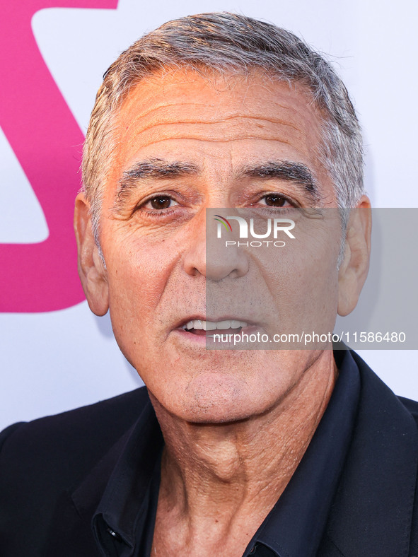 George Clooney arrives at the Los Angeles Premiere Of Apple TV+'s 'Wolfs' held at the TCL Chinese Theatre IMAX on September 18, 2024 in Holl...