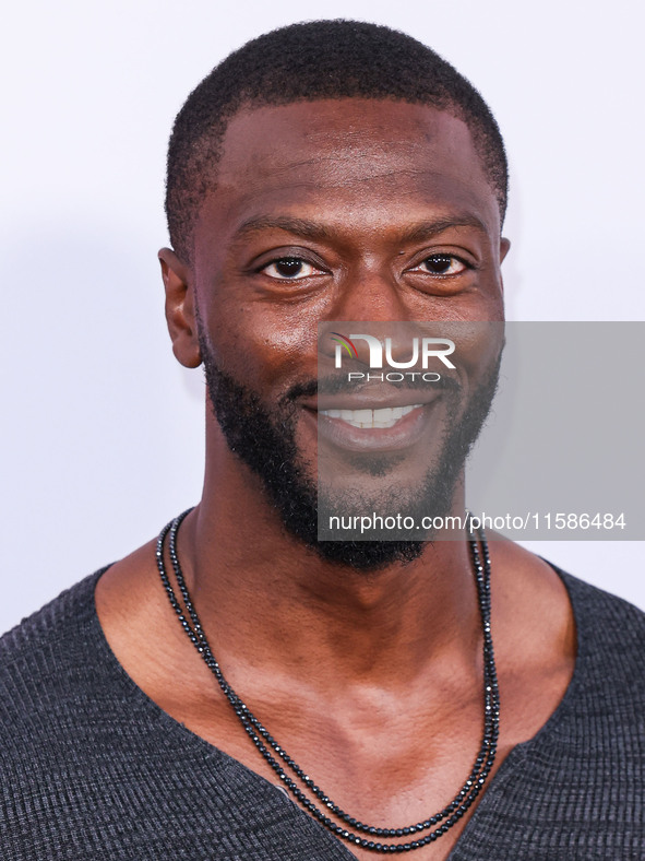 Aldis Hodge arrives at the Los Angeles Premiere Of Apple TV+'s 'Wolfs' held at the TCL Chinese Theatre IMAX on September 18, 2024 in Hollywo...