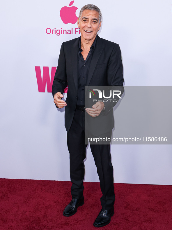 George Clooney arrives at the Los Angeles Premiere Of Apple TV+'s 'Wolfs' held at the TCL Chinese Theatre IMAX on September 18, 2024 in Holl...