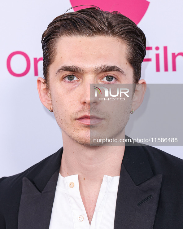 Austin Abrams arrives at the Los Angeles Premiere Of Apple TV+'s 'Wolfs' held at the TCL Chinese Theatre IMAX on September 18, 2024 in Holly...