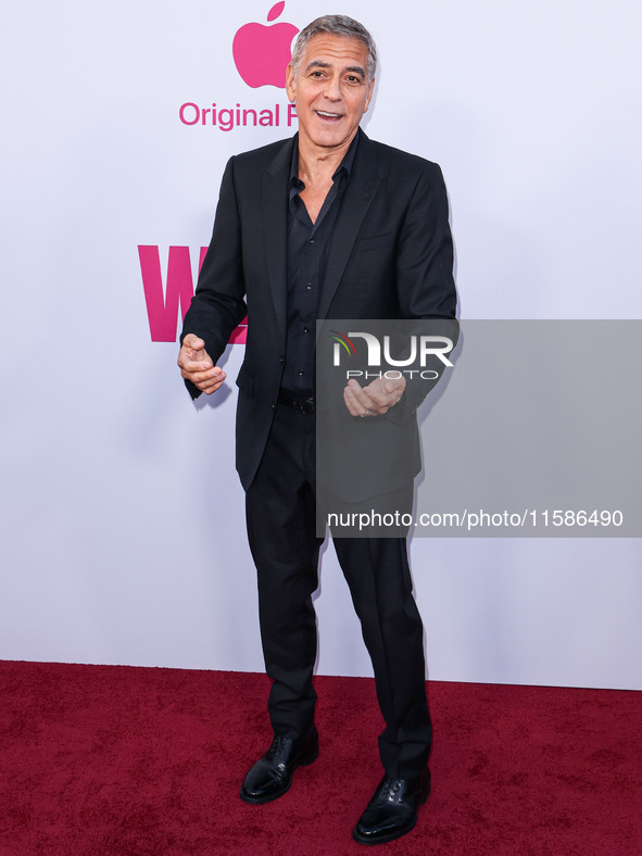 George Clooney arrives at the Los Angeles Premiere Of Apple TV+'s 'Wolfs' held at the TCL Chinese Theatre IMAX on September 18, 2024 in Holl...