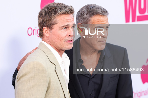 Brad Pitt and George Clooney arrive at the Los Angeles Premiere Of Apple TV+'s 'Wolfs' held at the TCL Chinese Theatre IMAX on September 18,...