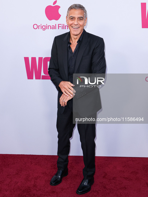 George Clooney arrives at the Los Angeles Premiere Of Apple TV+'s 'Wolfs' held at the TCL Chinese Theatre IMAX on September 18, 2024 in Holl...