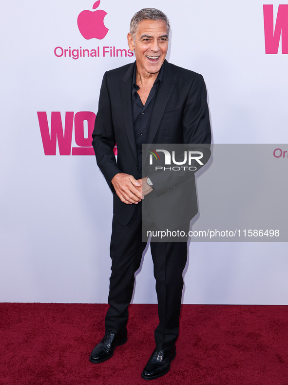 George Clooney arrives at the Los Angeles Premiere Of Apple TV+'s 'Wolfs' held at the TCL Chinese Theatre IMAX on September 18, 2024 in Holl...