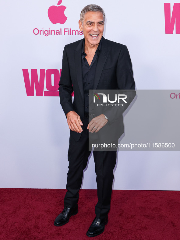 George Clooney arrives at the Los Angeles Premiere Of Apple TV+'s 'Wolfs' held at the TCL Chinese Theatre IMAX on September 18, 2024 in Holl...