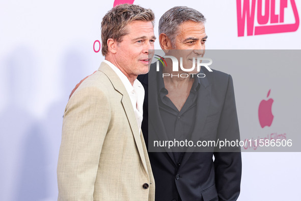 Brad Pitt and George Clooney arrive at the Los Angeles Premiere Of Apple TV+'s 'Wolfs' held at the TCL Chinese Theatre IMAX on September 18,...