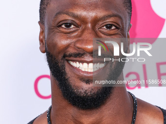 Aldis Hodge arrives at the Los Angeles Premiere Of Apple TV+'s 'Wolfs' held at the TCL Chinese Theatre IMAX on September 18, 2024 in Hollywo...