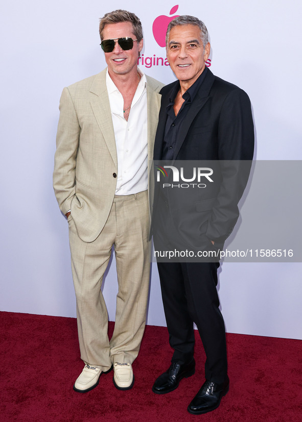 Brad Pitt and George Clooney arrive at the Los Angeles Premiere Of Apple TV+'s 'Wolfs' held at the TCL Chinese Theatre IMAX on September 18,...