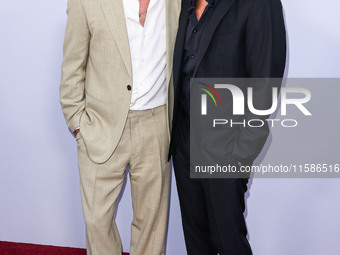 Brad Pitt and George Clooney arrive at the Los Angeles Premiere Of Apple TV+'s 'Wolfs' held at the TCL Chinese Theatre IMAX on September 18,...