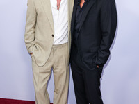 Brad Pitt and George Clooney arrive at the Los Angeles Premiere Of Apple TV+'s 'Wolfs' held at the TCL Chinese Theatre IMAX on September 18,...