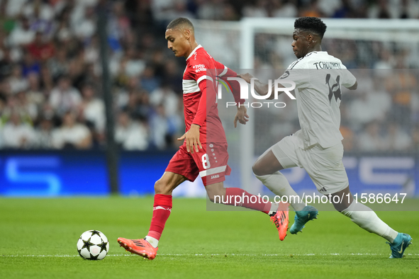 Enzo Millot attacking midfield of Stuttgart and France and Aurelien Tchouameni defensive midfield of Real Madrid and France compete for the...