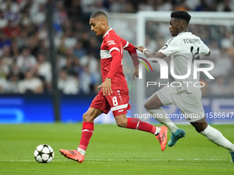 Enzo Millot attacking midfield of Stuttgart and France and Aurelien Tchouameni defensive midfield of Real Madrid and France compete for the...