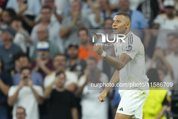 Kylian Mbappe centre-forward of Real Madrid and France celebrates after scoring his sides first goal during the UEFA Champions League 2024/2...