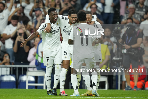 Kylian Mbappe centre-forward of Real Madrid and France celebrates after scoring his sides first goal qith Vinicius Junior, Jude Bellingham a...