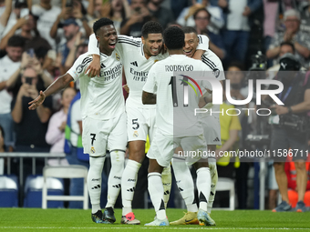 Kylian Mbappe centre-forward of Real Madrid and France celebrates after scoring his sides first goal qith Vinicius Junior, Jude Bellingham a...