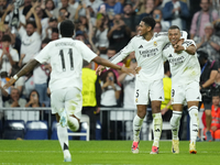 Kylian Mbappe centre-forward of Real Madrid and France celebrates after scoring his sides first goal with Jude Bellingham and Rodrygo Goes...