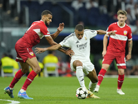 Kylian Mbappe centre-forward of Real Madrid and France and Josha Vagnoman right-back of Stuttgart and Germany compete for the ball during th...