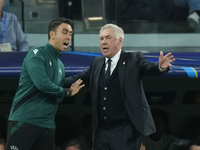 Carlo Ancelotti head coach of Real Madrid protest to referee during the UEFA Champions League 2024/25 League Phase MD1 match between Real Ma...